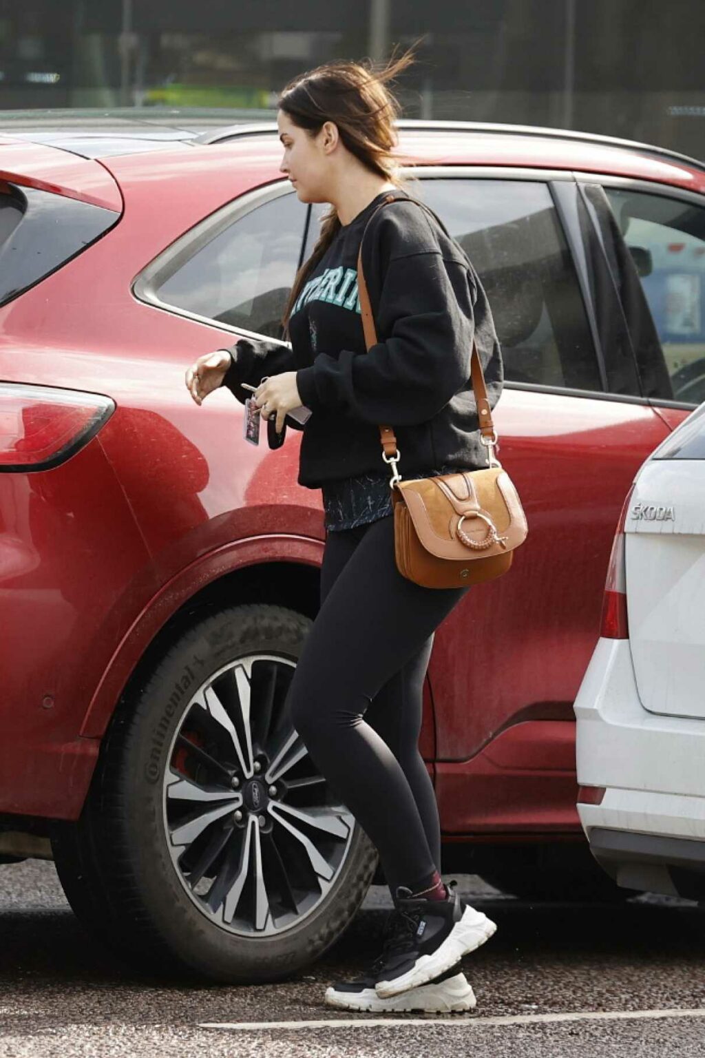 Jacqueline Jossa in a Black Leggings Arrives at Her Home in Essex 03/16
