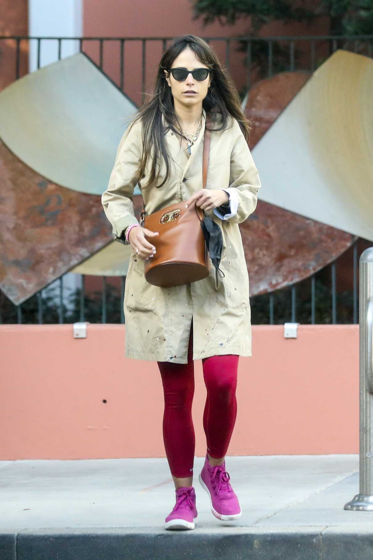 Jordana Brewster in a Red Leggings