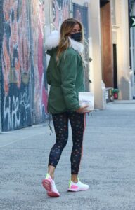 Kelly Bensimon in a Green Jacket