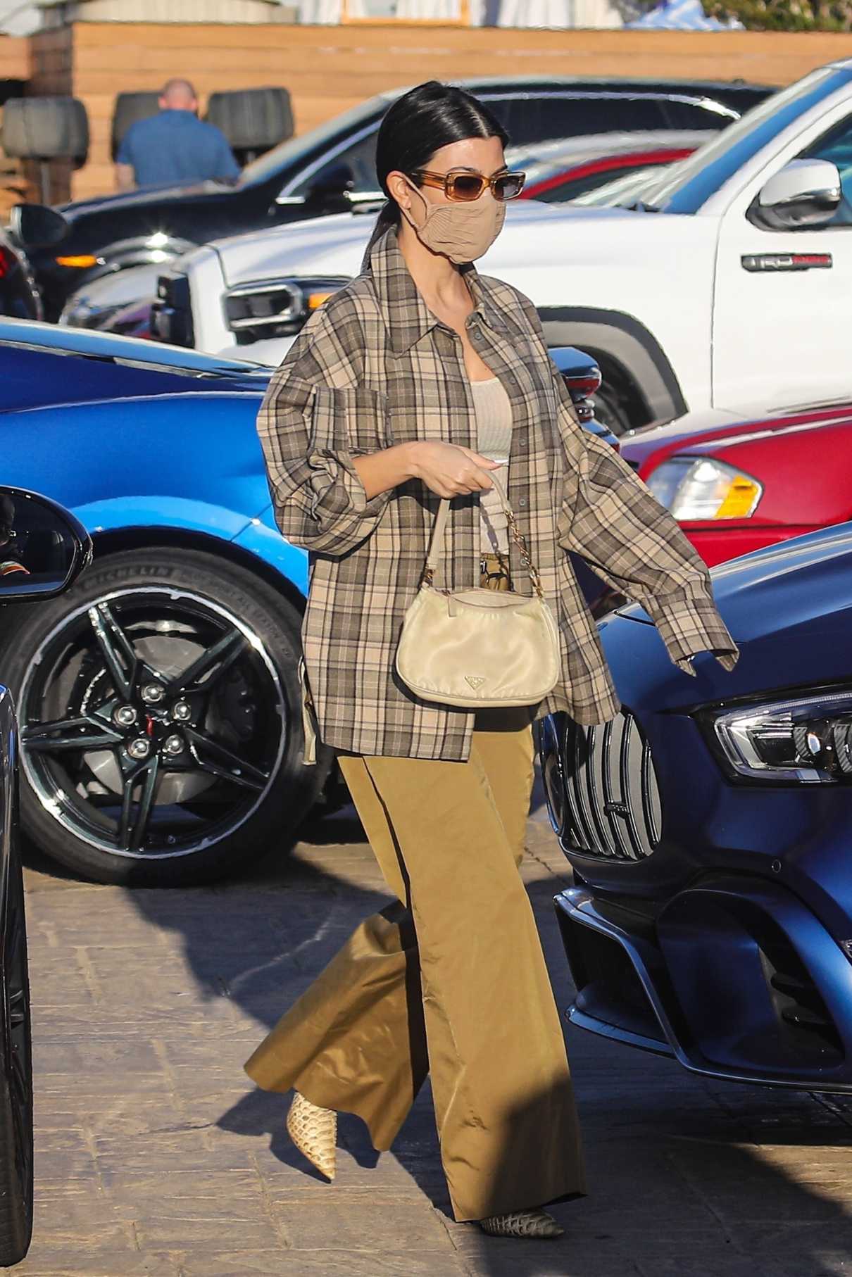 Kourtney Kardashian in a Plaid Shirt