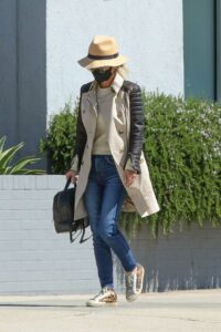 Laeticia Hallyday in a Beige Hat