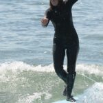 Leighton Meester in a Black Hat Shows Off Her Impressive Surfing Skills in Malibu 03/20/2021