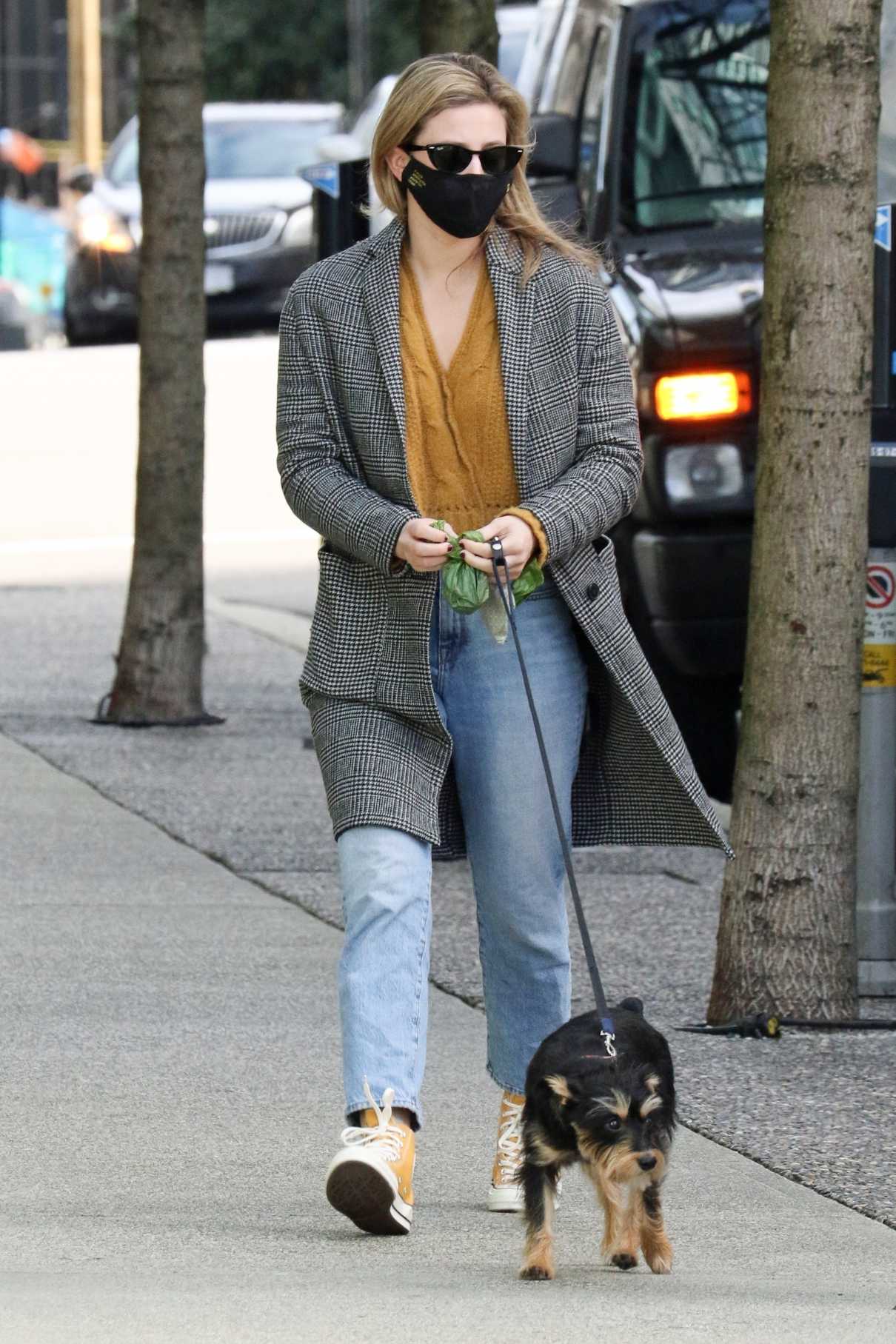 Lili Reinhart in a Grey Coat Walks Her Dog Milo in Vancouver 03/09/2021