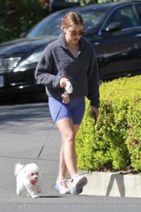 Lucy Hale in a Blue Spandex Shorts