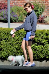 Lucy Hale in a Blue Spandex Shorts