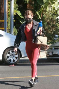 Lucy Hale in a Red Leggings