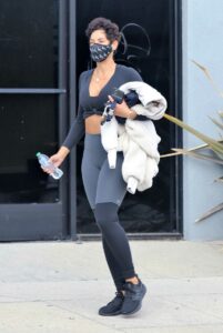 Nicole Murphy in a Black Sneakers