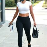 Nicole Murphy in a White Top Leaves the Gym in Los Angeles 03/17/2021