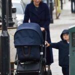 Pippa Middleton in a Blue Coat Pushing Newborn Daughter Grace in Her Pram in West London 03/25/2021