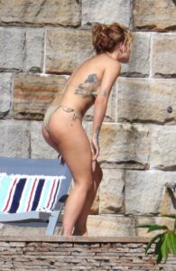 Rita Ora in an Olive Bikini