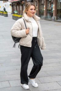 Sian Welby in a Beige Puffer Jacket