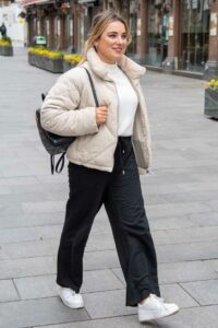 Sian Welby in a Beige Puffer Jacket