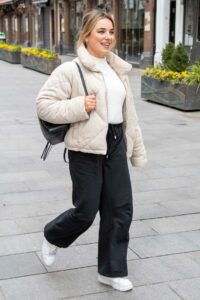 Sian Welby in a Beige Puffer Jacket