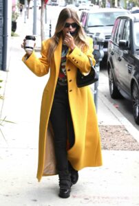 Sofia Richie in a Yellow Coat