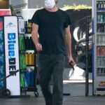 Aaron Paul in a Black Tee Makes a Stop at His Local Gas Station in Los Feliz 04/15/2021