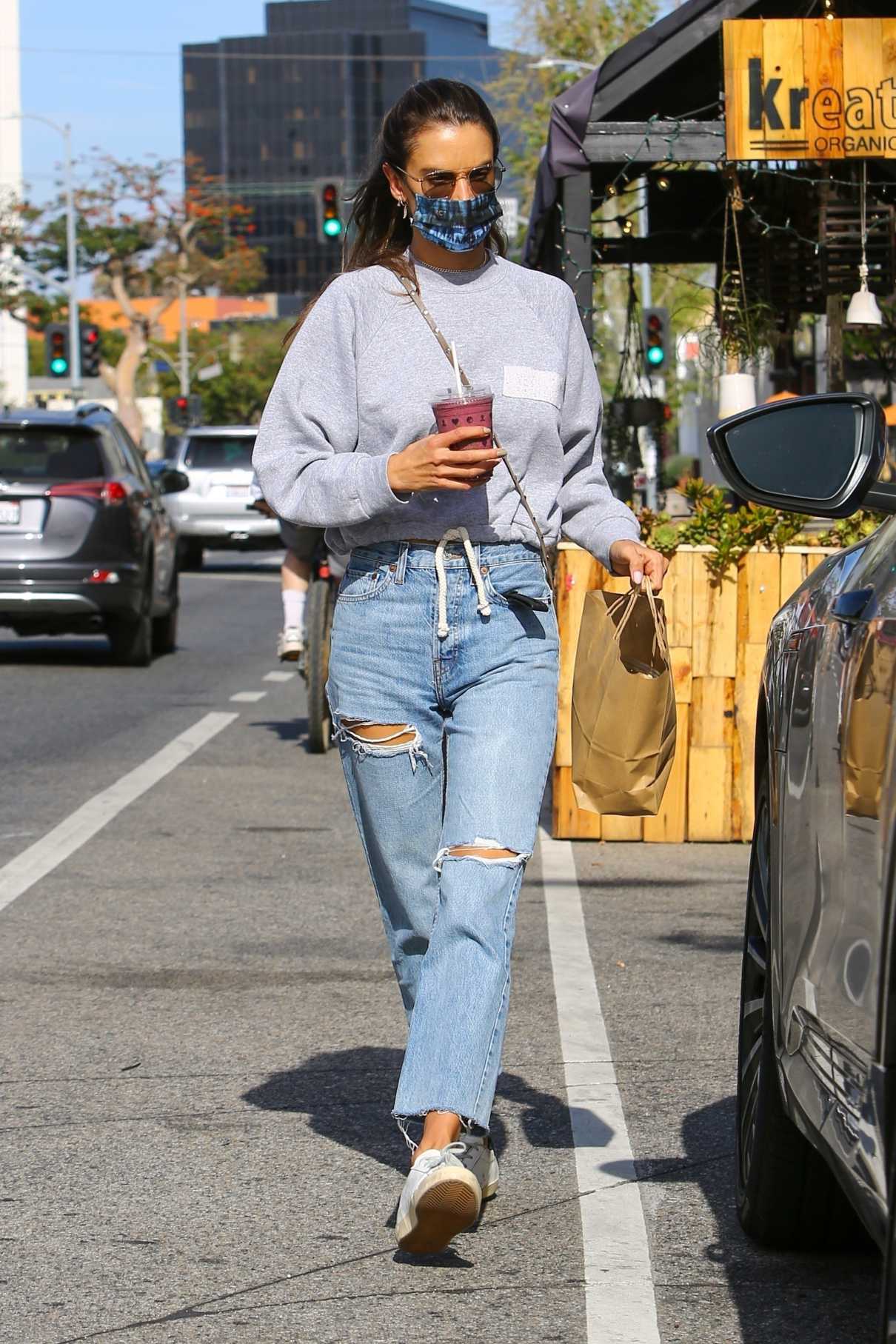 Alessandra Ambrosio in a Blue Riped Jeans