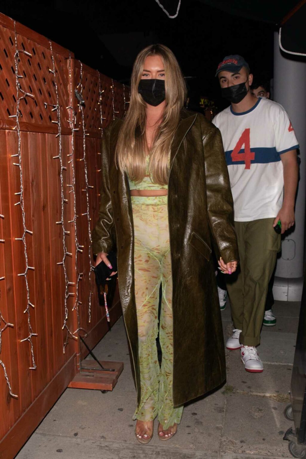 Anastasia Karanikolaou in an Olive Leather Coat Steps Out at the Nice