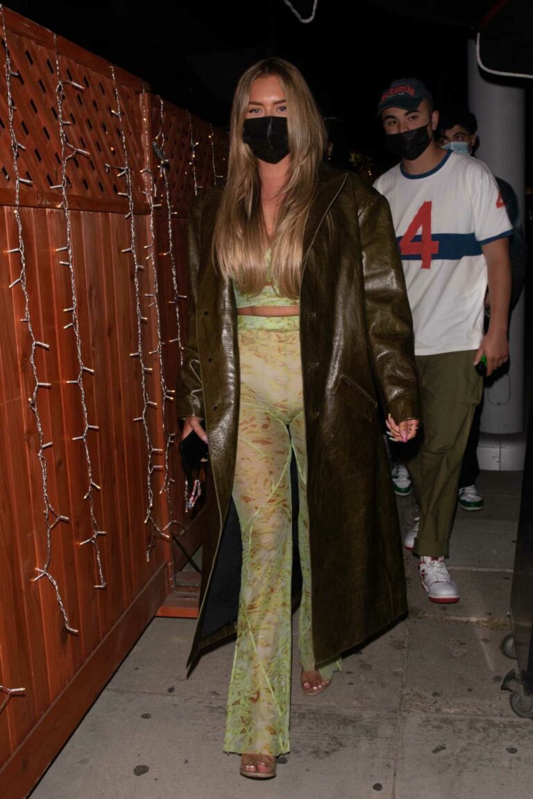 Anastasia Karanikolaou in an Olive Leather Coat Steps Out at the Nice