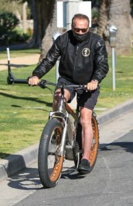 Arnold Schwarzenegger in a Black Outfit