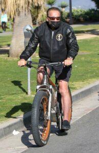 Arnold Schwarzenegger in a Black Outfit