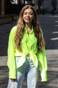 Becky Hill in a Neon Green Shirt