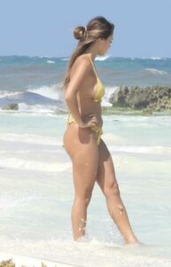 Desiree Schlotz in a Gold Bikini