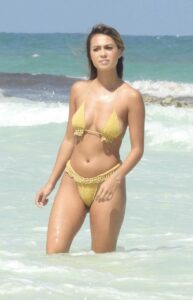 Desiree Schlotz in a Gold Bikini