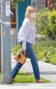 Emma Roberts in a Striped Blouse