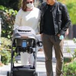 Henry Golding in a Black Leather Jacket Enjoys a Stroll with His Wife Liv Lo and Their Newborn in Los Angeles 04/06/2021