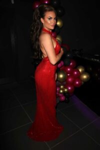 Kelsey Stratford in a Red Dress