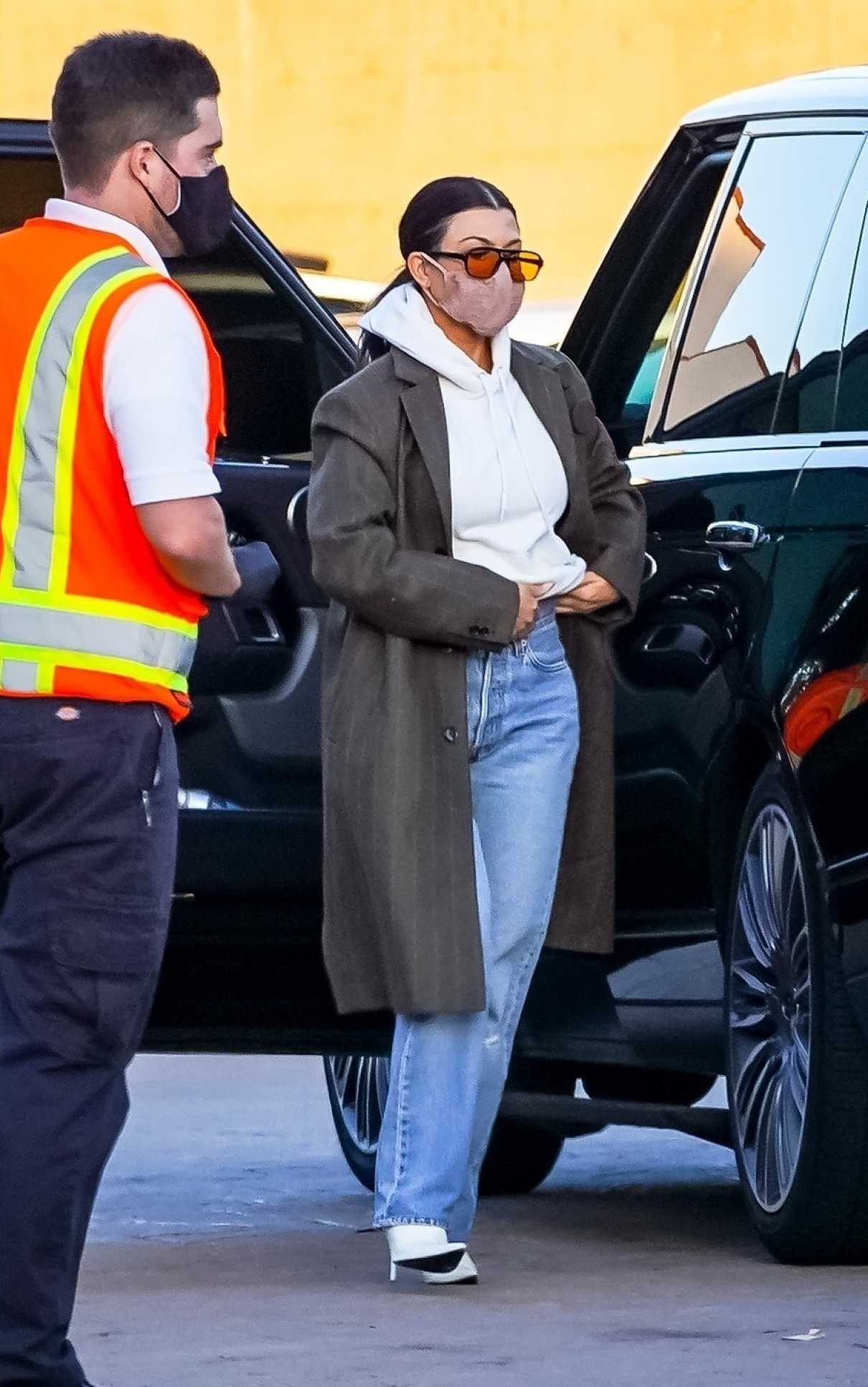 Kourtney Kardashian in a Grey Coat