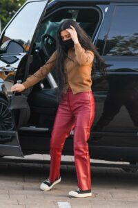 Kourtney Kardashian in a Red Leather Pants