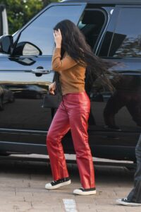 Kourtney Kardashian in a Red Leather Pants