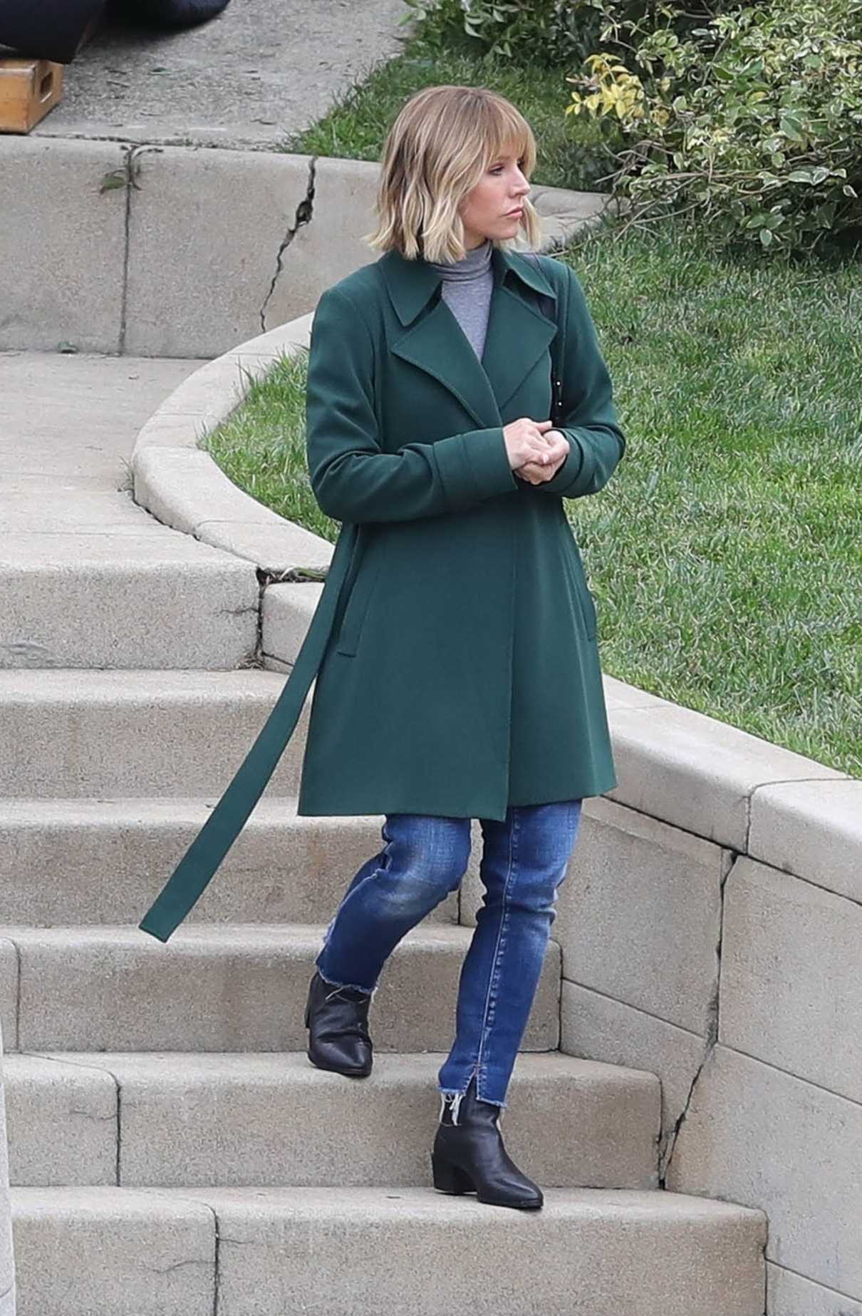 Kristen Bell in a Green Coat on the Set of The Woman in The House in