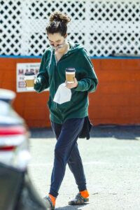 Lena Headey in a Green Hoodie