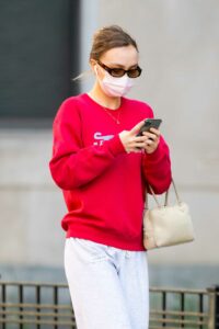 Lily-Rose Depp in a Red Sweatshirt