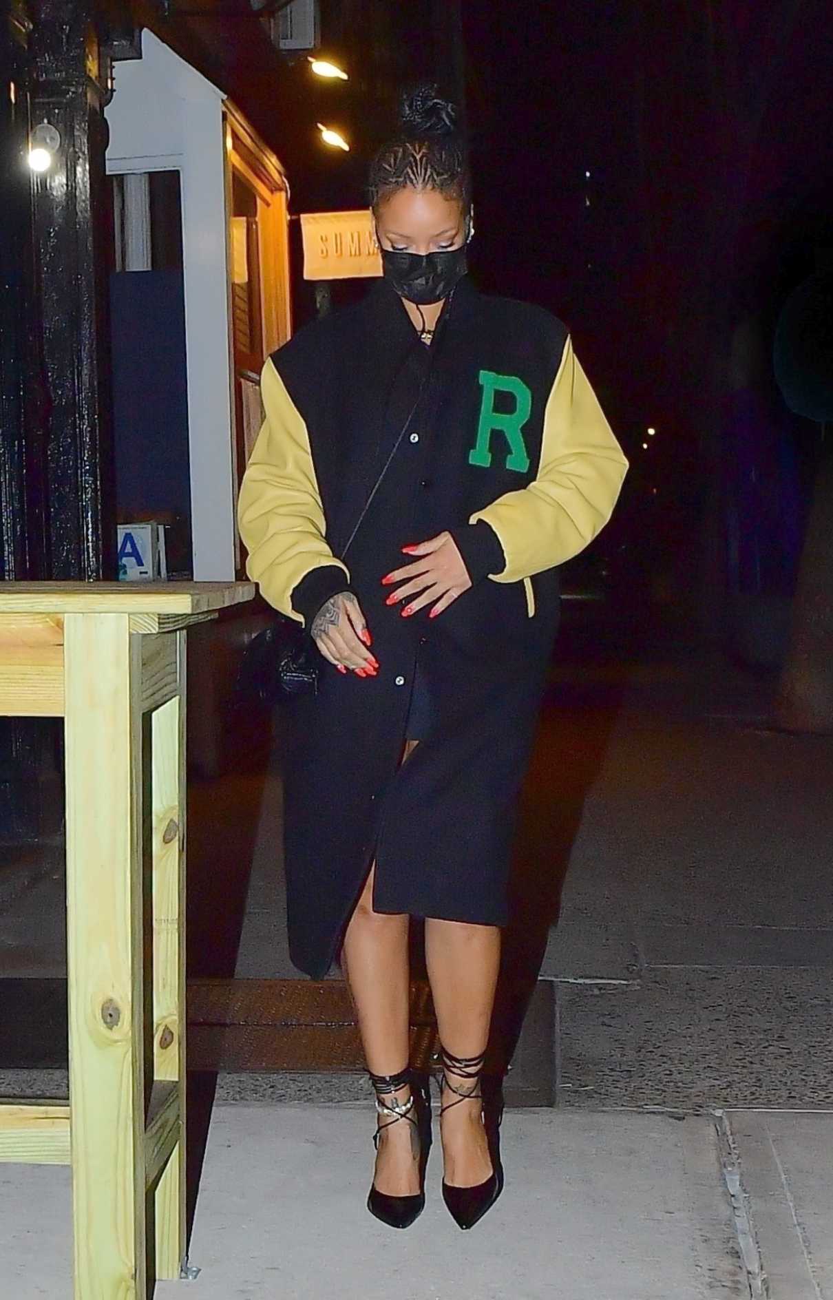 Rihanna in a Black Protective Mask