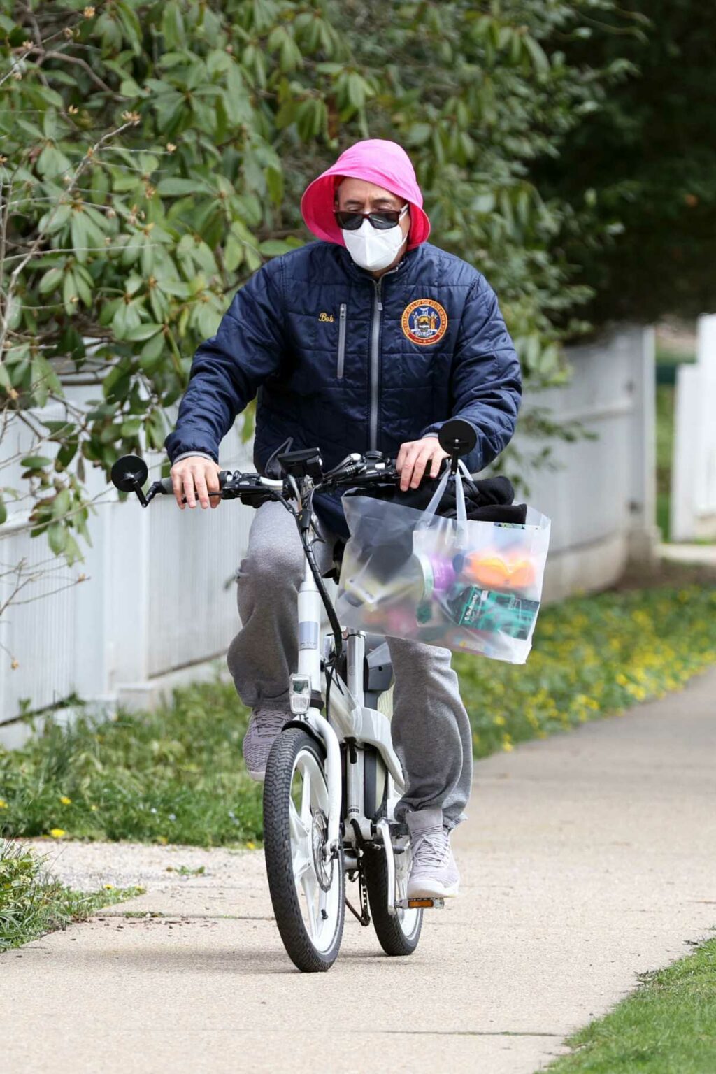 Robert Downey Jr. in a Grey Sweatpants Goes Grocery Shopping on a Bike in the Hamptons, New York