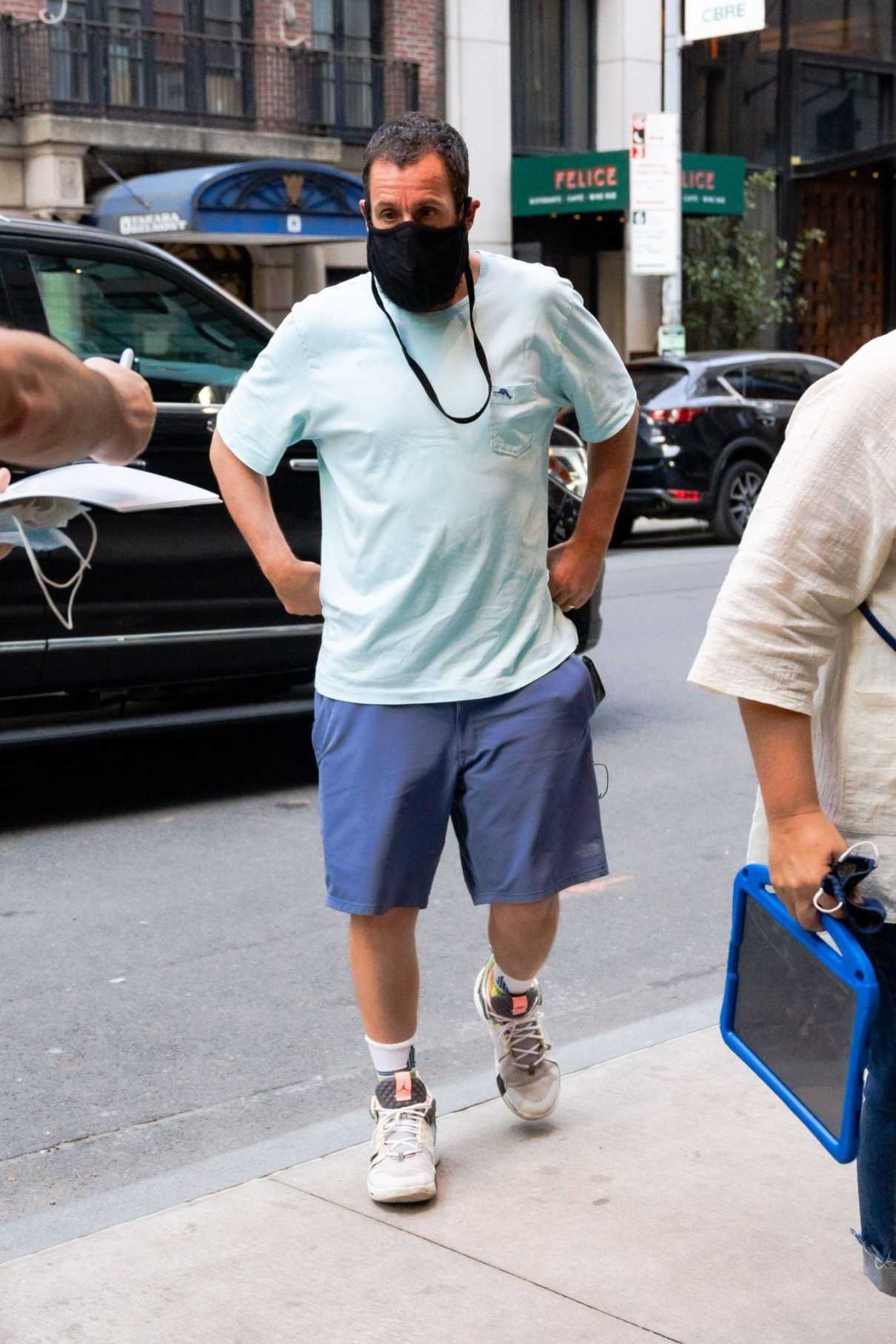 Adam Sandler in a Blue Shorts