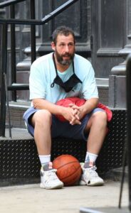 Adam Sandler in a Blue Shorts