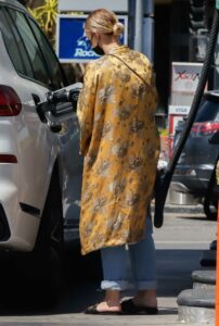 Ashlee Simpson in a Gold Cardigan