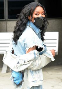 Brandy Norwood in a Black Protective Mask