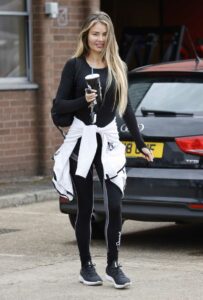 Chloe Sims in a Black Sneakers