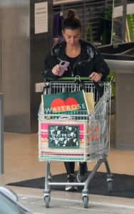 Coleen Rooney in a Black Outfit