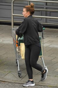 Coleen Rooney in a Black Outfit