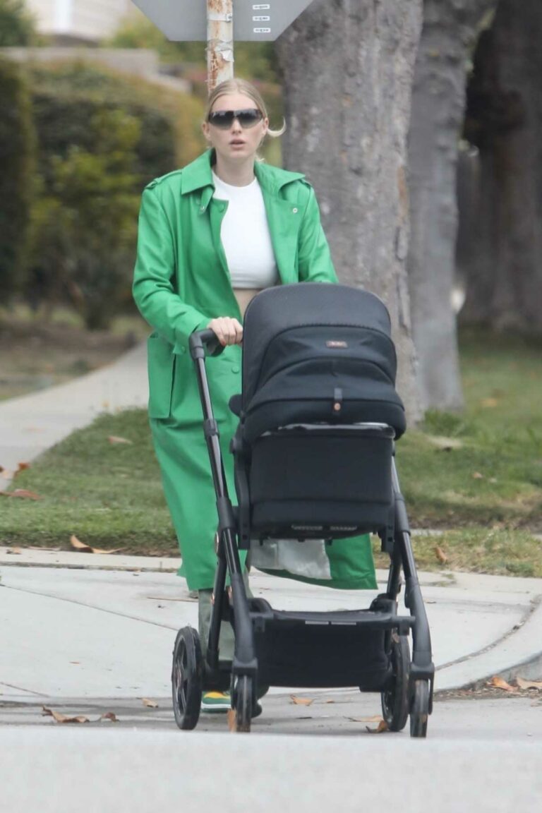 Elsa Hosk in a Green Trench Coat Was Seen Out with Her Daughter in Los