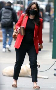 Eva Pilgrim in a Red Blazer