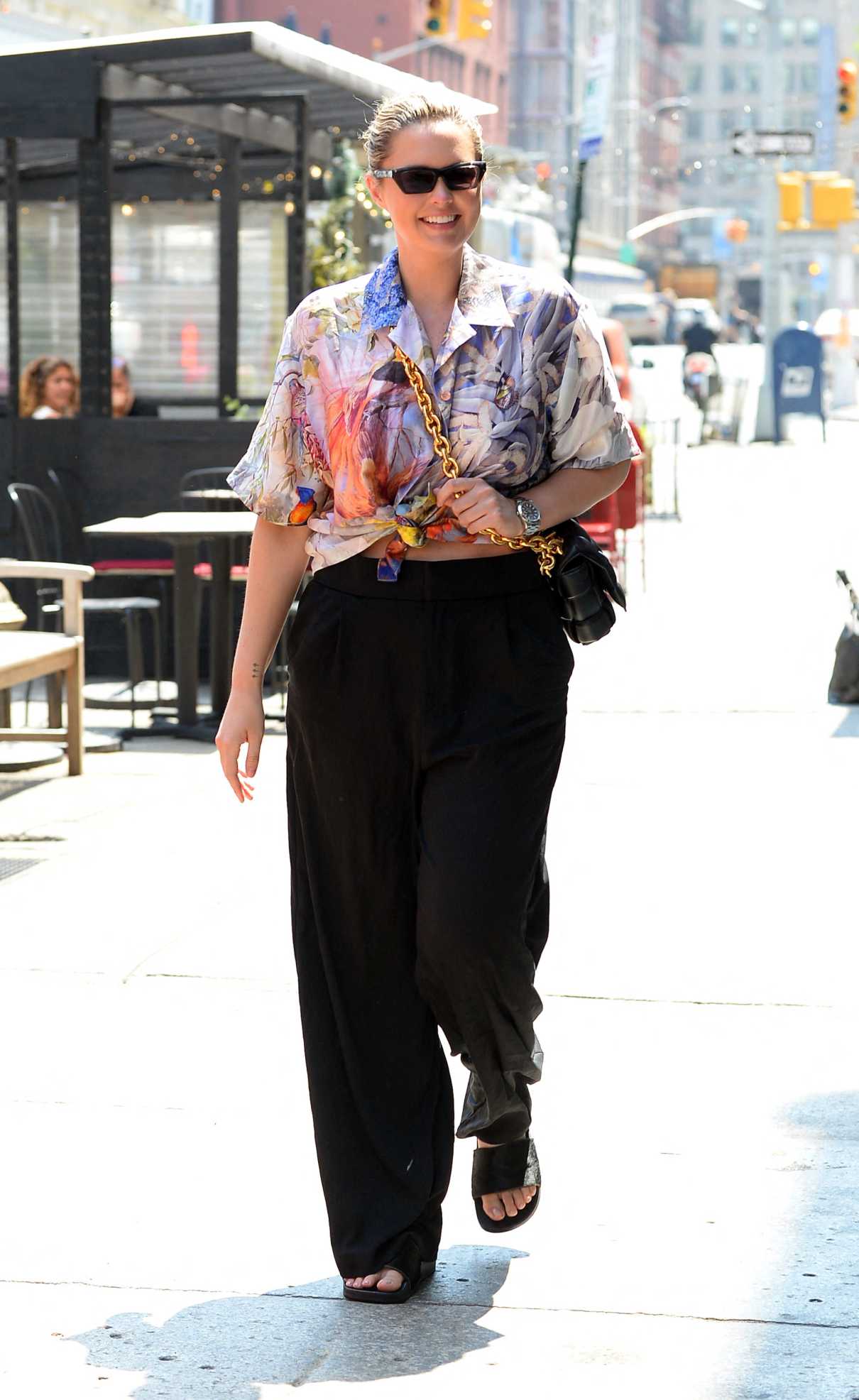 Georgina Burke in a Floral Blouse