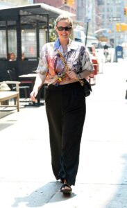 Georgina Burke in a Floral Blouse