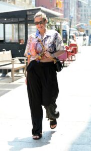 Georgina Burke in a Floral Blouse